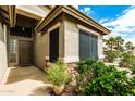 Inviting home featuring a decorative glass front door and low-maintenance landscaping at 29915 N Maravilla Dr, San Tan Valley, AZ 85143