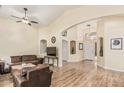 Open living space with wood floors, light walls, and comfortable seating at 29915 N Maravilla Dr, San Tan Valley, AZ 85143