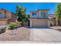 Charming two-story home with a well-manicured front yard and inviting curb appeal at 3233 E Sequoia Dr, Phoenix, AZ 85050