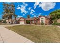 Charming single-story home with a well-manicured lawn and inviting curb appeal at 3756 E Clovis Ave, Mesa, AZ 85206