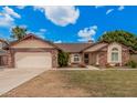 Charming single-story home with a well-manicured lawn and inviting curb appeal at 3756 E Clovis Ave, Mesa, AZ 85206