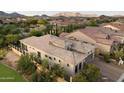 Aerial view of home showing tile roof, desert landscaping and stunning mountain views at 8234 E Inca St, Mesa, AZ 85207