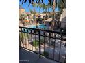 Beautiful pool area with lounge chairs and lush landscaping for a resort-like feel at 14145 N 92Nd St # 2004, Scottsdale, AZ 85260