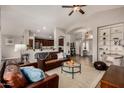 Spacious living area with an open layout flowing into a well-equipped kitchen, great for entertaining at 16055 S 18Th Dr, Phoenix, AZ 85045
