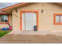Inviting front entryway, featuring security door and neat landscaping at 4160 W Granada Rd, Phoenix, AZ 85009