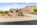 Inviting single-story home with desert landscaping, gravel yard, and attached garage at 5649 E Desert Forest Trl, Cave Creek, AZ 85331