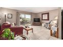 Bright living room with a balcony, creating a relaxing indoor-outdoor living experience at 7436 E Chaparral Rd # 124B, Scottsdale, AZ 85250