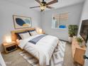 Comfortable bedroom with natural light, neutral tones, and stylish decor at 1211 S Pueblo Ct, Gilbert, AZ 85233