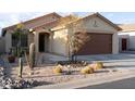 Charming single-story home with desert landscaping and a well-manicured front yard at 18102 E El Viejo Desierto --, Gold Canyon, AZ 85118
