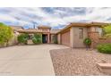 Inviting single-story home boasting a well-manicured landscape and a covered entrance at 3613 W Plymouth Dr, Anthem, AZ 85086