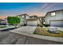 Charming townhome with an attached two-car garage, mature tree, and drought tolerant landscaping at 4301 N 21St St # 3, Phoenix, AZ 85016