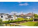 Beautiful home with mountain views and perfectly manicured lawn surrounded by lush greenery and mature trees at 4416 N 37Th Way, Phoenix, AZ 85018