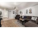 Inviting living room with plush seating, neutral tones, and ample space for relaxation and entertainment at 13359 W Post Dr, Surprise, AZ 85374
