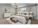 Serene bedroom featuring a plush bed, stylish furniture, and soft colors to create a tranquil retreat at 2006 N Arrowhead Dr, Chandler, AZ 85224