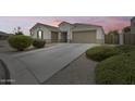 Beautiful single-Gathering home featuring a well-maintained yard and a spacious three-car garage at 35773 N Loemann Dr, San Tan Valley, AZ 85143