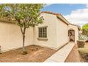 Side exterior view showing the window and front entryway at 1375 W Belmont Red Trl, San Tan Valley, AZ 85143