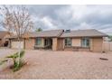 Inviting single-Gathering home with a desert landscape and a well-maintained brick exterior at 2502 S Mollera Cir, Mesa, AZ 85210