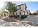 Two-story home featuring a tile roof, landscaped yard with mature trees and side entry garage at 2868 E Binner Dr, Chandler, AZ 85225