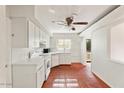 Bright kitchen featuring white appliances and retro tile flooring at 3532 N Carhill Ave, Scottsdale, AZ 85251