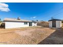 Spacious backyard features a storage shed and ample space for outdoor activities and landscaping at 6821 W Mariposa St, Phoenix, AZ 85033