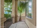 Covered front porch with decorative pillars providing shade and curb appeal at 6858 W Potter Dr, Glendale, AZ 85308