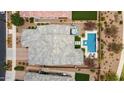 Aerial view showcasing a private backyard with a swimming pool, hot tub, and lush greenery at 10631 E Tallahassee Ave, Mesa, AZ 85212