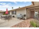 Outdoor patio featuring a seating area and grill at 12542 W Parkwood Dr, Sun City West, AZ 85375