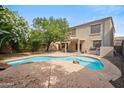 Backyard pool featuring a large patio area, perfect for outdoor entertaining and relaxation at 2323 W Hunter Ct, Phoenix, AZ 85085