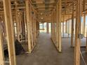 Interior view of new home construction showing the layout and framing of the home at 4521 S 95Th Dr, Tolleson, AZ 85353