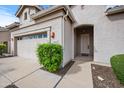 Inviting single-story home featuring a well-manicured lawn and charming curb appeal at 4960 E Villa Theresa Dr, Scottsdale, AZ 85254