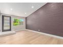 Inviting living room with a view of the front yard through a large window at 1624 E Campbell Ave # 51, Phoenix, AZ 85016