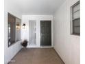 Inviting front porch with seating area and natural light at 19018 N Concho Cir, Sun City, AZ 85373