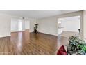 Spacious living room featuring hardwood floors and an open layout at 19018 N Concho Cir, Sun City, AZ 85373