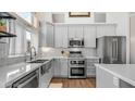 Well-appointed kitchen featuring stainless appliances, stylish countertops, and ample cabinet space for storage at 3521 N Barron --, Mesa, AZ 85207
