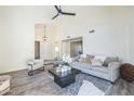 Spacious living room featuring high ceilings, modern decor, and comfortable seating at 4024 E Hiddenview Dr, Phoenix, AZ 85048