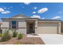 Charming single-story home featuring desert landscaping and a two-car garage at 18492 E Donato Dr, Gold Canyon, AZ 85118