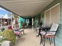 Relaxing covered patio area with ample seating, perfect for enjoying the outdoors at 120 N Val Vista Dr # 151, Mesa, AZ 85213