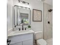 Stylish bathroom featuring modern fixtures, marble countertops, and a walk-in shower at 17019 E Calaveras Ave, Fountain Hills, AZ 85268