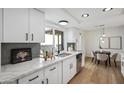 Updated kitchen featuring quartz countertops, stainless steel appliances, and modern cabinetry at 17019 E Calaveras Ave, Fountain Hills, AZ 85268