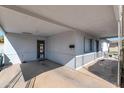 Covered entryway with neutral paint and iron security door at 3422 W Poinsettia Dr, Phoenix, AZ 85029