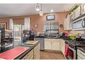 Bright and functional kitchen featuring stainless steel appliances and an open layout at 44810 W Horse Mesa Rd, Maricopa, AZ 85139