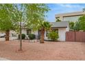 Exterior view of a cozy home with a xeriscaped front yard and mature landscaping at 5025 N 20Th Ave, Phoenix, AZ 85015