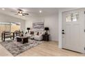 Bright living room featuring modern furniture, stylish decor, and ample natural light at 7125 N 23Rd Ave, Phoenix, AZ 85021