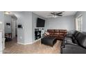 Cozy living room with tile flooring and a built-in entertainment niche at 125 S 56Th St # 36, Mesa, AZ 85206