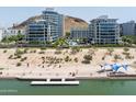 Beautiful aerial view showcasing condos next to Tempe Town Lake with recreation areas at 140 E Rio Salado Pkwy # 512, Tempe, AZ 85281