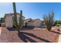 Well-landscaped front yard showcasing desert plants, adding to the property's curb appeal at 150 N Nielson St, Gilbert, AZ 85234
