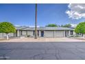 Charming single-story home featuring a well-manicured yard, and an attached two-car garage at 7950 E Keats Ave # 175, Mesa, AZ 85209