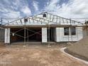 This is an image of a new home under construction showcasing the frame at 9536 W Parkway Dr, Tolleson, AZ 85353