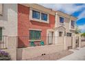 Charming townhouse featuring a private patio with seating, perfect for enjoying the Arizona weather at 1950 N Center St # 115, Mesa, AZ 85201