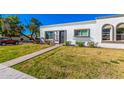 Charming single-story home with well-maintained lawn and walkway at 5047 N 83Rd St, Scottsdale, AZ 85250
